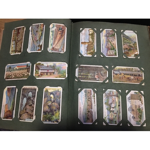 100U - FANTASTIC Vintage cigarette card album filled with sets of cigarette cards.
CHECK OUT ALL THE PHOTOG... 