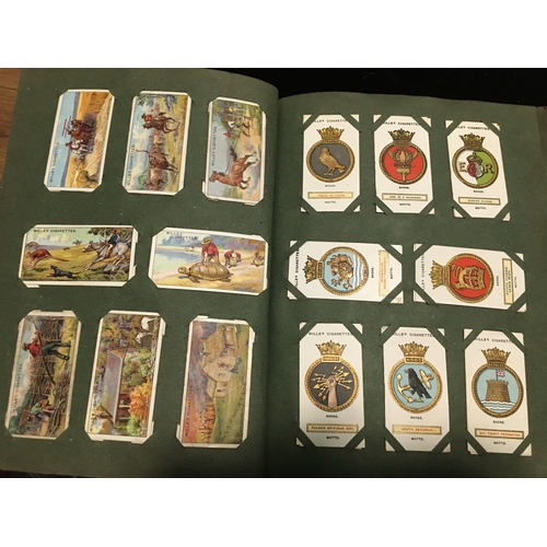 100U - FANTASTIC Vintage cigarette card album filled with sets of cigarette cards.
CHECK OUT ALL THE PHOTOG... 