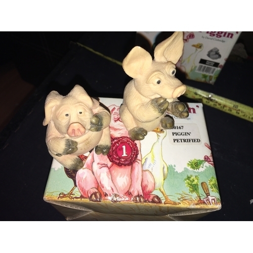 61 - BOXED PIGGIN FIGURE