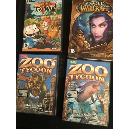 SLECTION OF CLASSIC PC GAMES INCLUDING WORLD OF WARCRAFT, RUGRATS ETC