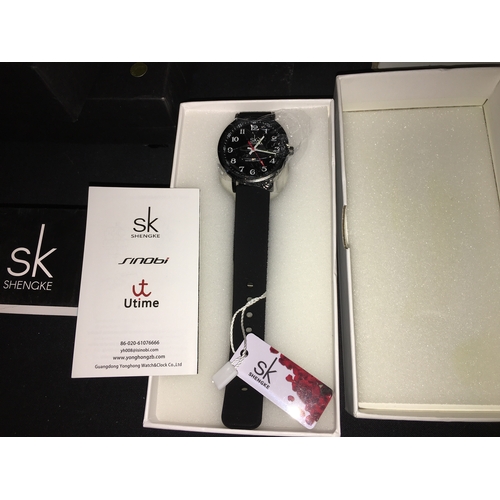 185 - NEW BOXED SHENJKI LADIES WATCH IN BLACK