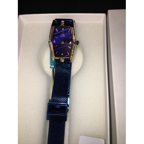 187 - NEW BOXED SHENJKI LADIES WATCH IN BLUE