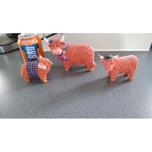 358 - THREE SCOTTISH COW ORNAMENTS