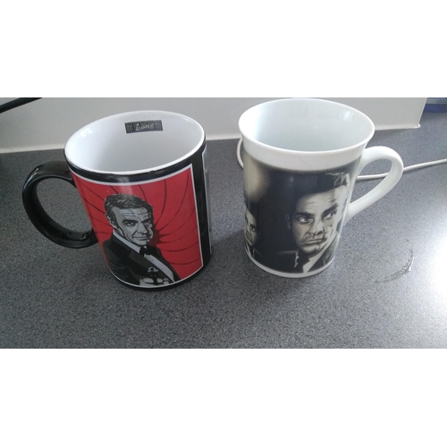 389 - TWO SEAN CONNERY AS JAMES BOND MUGS