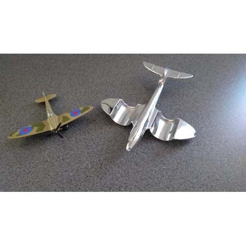 405 - two metal aeroplanes