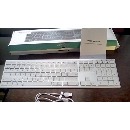 85 - NEW BOXED JELLY COMB DESK TOP KEYBOARD