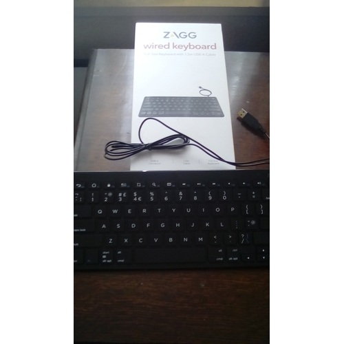 87 - NEW BOXED ZAGG Universal WIRED Keyboard