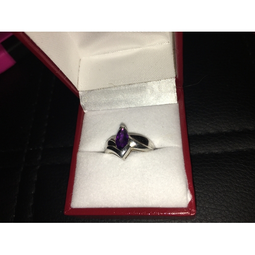 280M - A Lovely 925 Silver Ring With Purple Gem, Size k. in presentation box