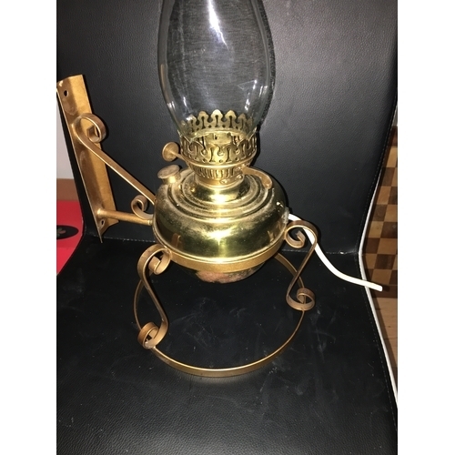 337 - WALL MOUNTED BRASS OIL LAMP WITH FUNNEL CONVERTED BUT WILL NEED REWIRED