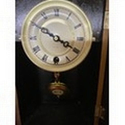 59 - VERY NICE Free standing or wall hanging 15 day clock measuring 20 x 40 cms tall with key