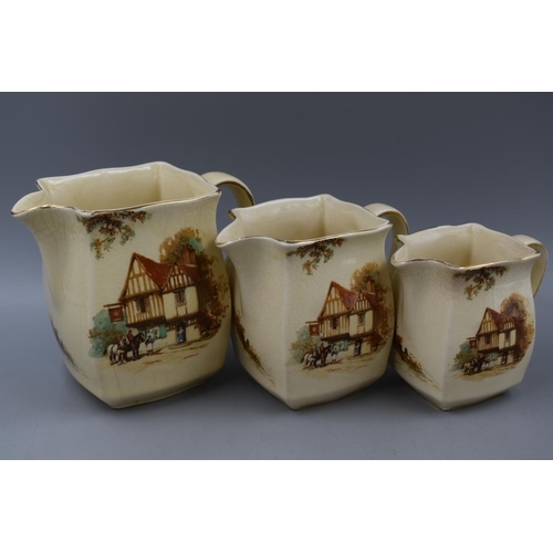 15 - THREE GRADUATED Ceramic Falcon Ware Whiskey Jugs