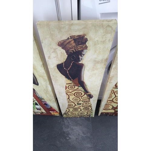 454 - LOVELY SET OF FOUR MATCHING AFRICAN LADY CANVASES