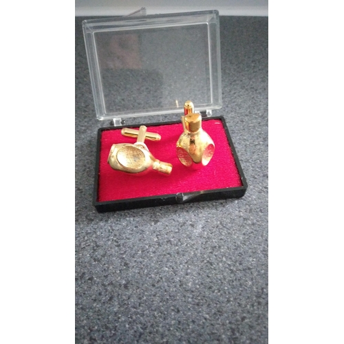 587 - PAIR OF BOTTLE CUFFLINKS BOXED