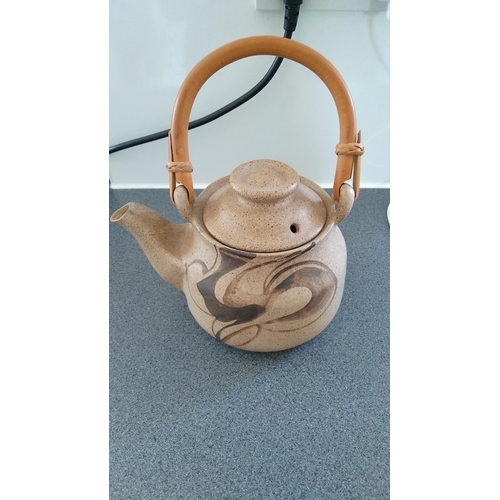 476 - NICE POTTERY TEA POT WITH WOODEN HANDLE