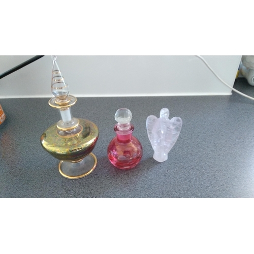 508 - THREE GLASS PERFUME BOTTLES