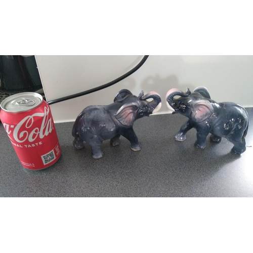 492 - PAIR OF CERAMIC ELEPHANTS