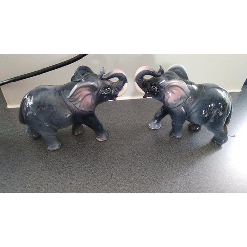 492 - PAIR OF CERAMIC ELEPHANTS