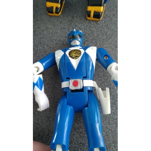 497 - SELECTION OF POWER RANGER FIGURES INCLUDING ONE WITH FLIP HEAD