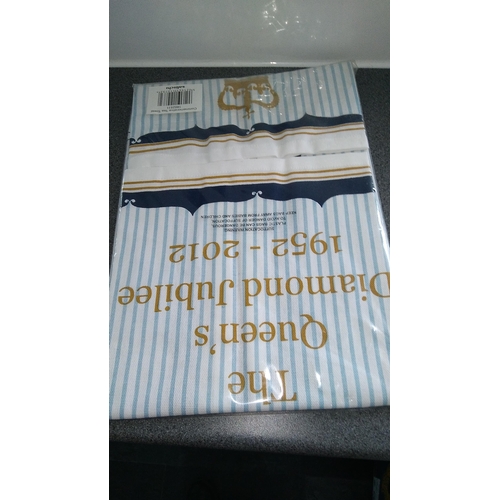 483 - 2012 DIAMOND JUBILEE TEA TOWEL IN ORIGINAL PACKAGING