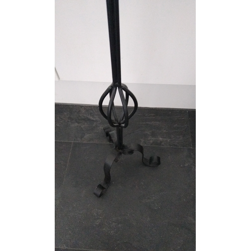 495 - WROUGHT IRON CANDLE HOLDER WITH CANDLE