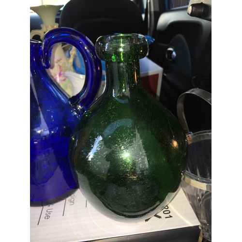 67 - Two Glass Hand Blown Pitchers to include Cobalt Blue and Emerald Green Largest 9