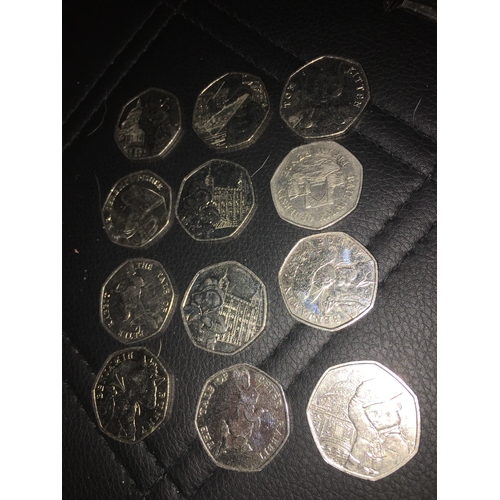 397 - selection of 12 collectible 50p coins