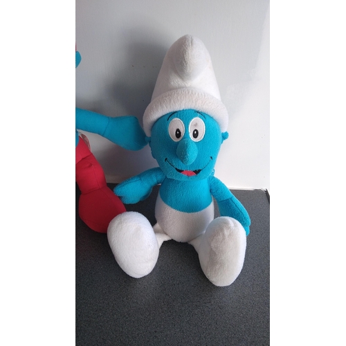 371 - TWO SMURFS SOFT TOYS