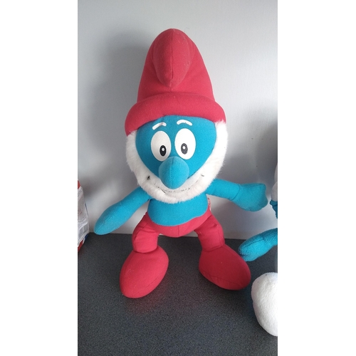 371 - TWO SMURFS SOFT TOYS