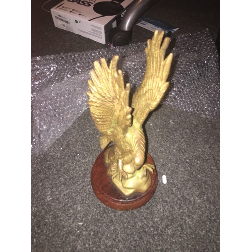 63 - CRACKING TALL BRASS EAGLE ON WOODEN PLINTH