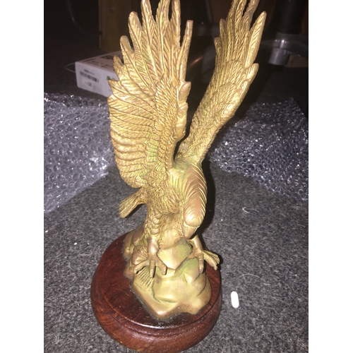 63 - CRACKING TALL BRASS EAGLE ON WOODEN PLINTH