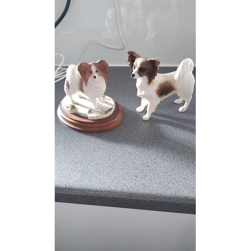 383 - TWO DOG FIGURES INCLUDING PAPILLION BEST OF BREED