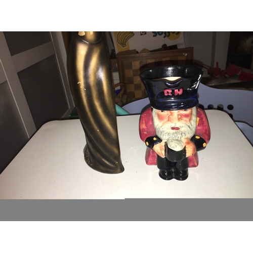 23 - LARGE LADY FIGURE AND SHORTER TOBY JUG, CHIP TO SIDE