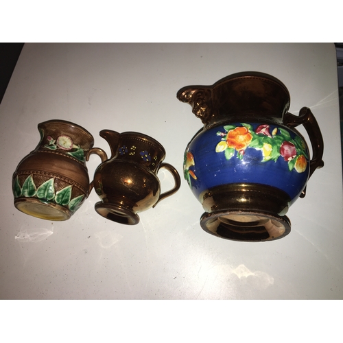 24 - TWO LUSTRE PIECES AND SMALL POTTERY DECORATED JUG