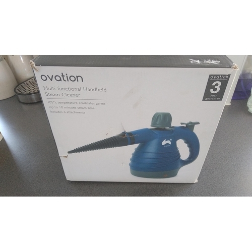 94 - NEW BOXED OVATION HAND HELD STEAMER