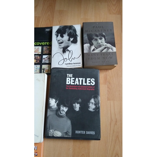 457 - GOOD SELECTION OF BEATLES BOOKS AND DVD'S