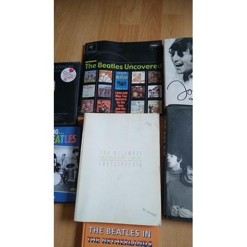 457 - GOOD SELECTION OF BEATLES BOOKS AND DVD'S