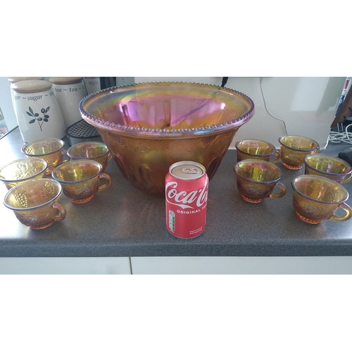 485 - Carnival glass punch bowl with 10 cups