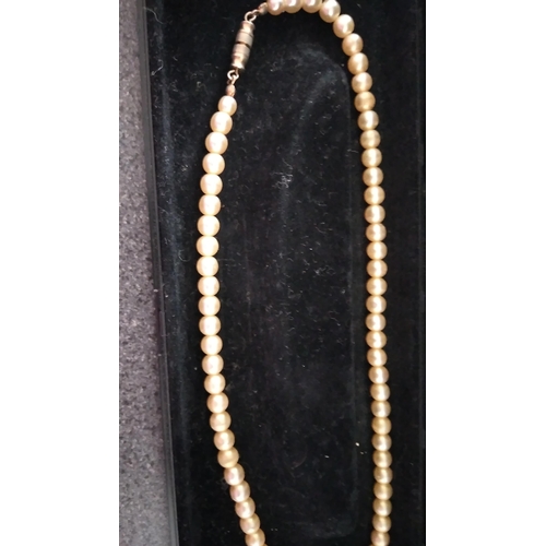 541 - TWO SETS OF PEARLS INCLUDING BOXED