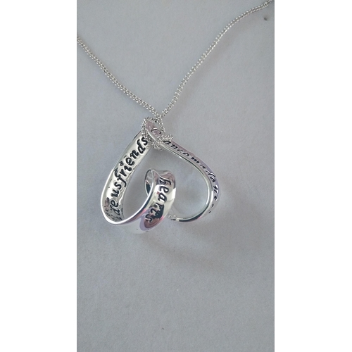 562 - SISTERS SILVER PLATED NECKLACE AND PENDANT BOXED