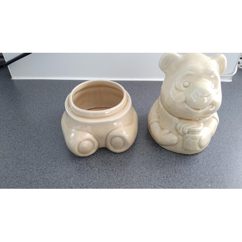 450 - WINNIE THE POO LIDDED DISNEY BISCUIT BARREL STAMPED TO BASE