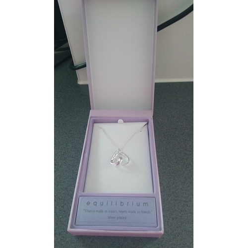 562 - SISTERS SILVER PLATED NECKLACE AND PENDANT BOXED