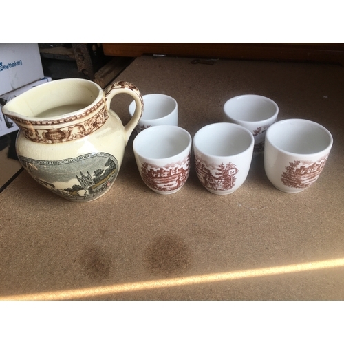 53 - FIVE VINTAGE EGG CUPS AND A VERY NICE ANTIQUE SCENIC MILK JUG 
please check all pics