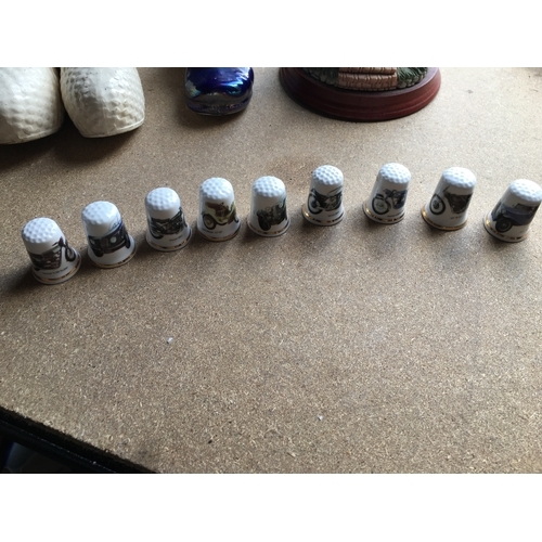 46 - NINE MOTOR CAR AND MOTOR BIKE THIMBLES