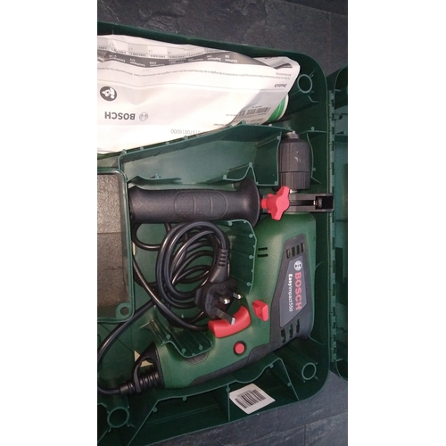 549 - CASED BOSCH POWER DRILL WORKING ORDER IN CASE