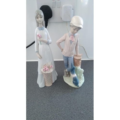 604 - TALL GIRL AND BOY FIGURINES