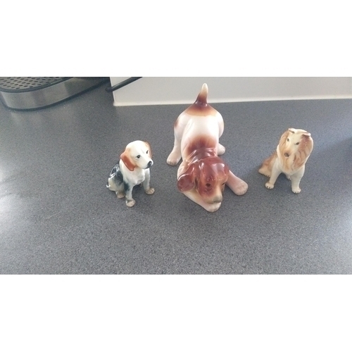 524 - THREE DOG FIGURINES