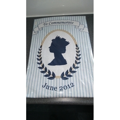 483 - 2012 DIAMOND JUBILEE TEA TOWEL IN ORIGINAL PACKAGING