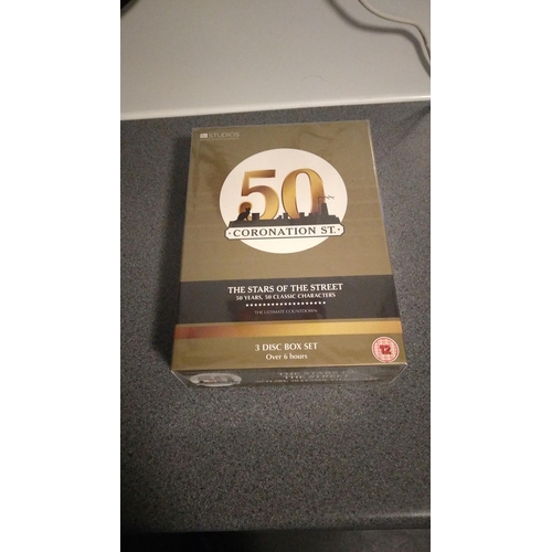 411 - NEW AND SEALED 50YRS CORONATION STREET 3 DISC BOX SET