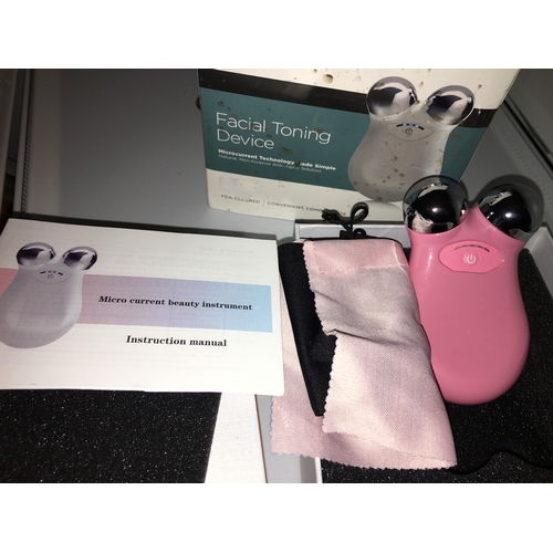 150E - NEW BOXED FACE TONING MASSAGER