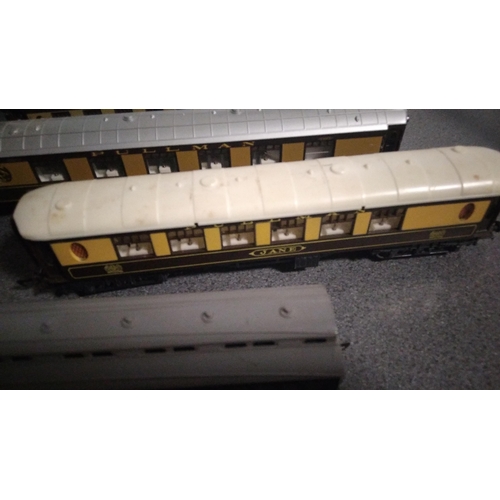 706 - FOUR MODEL TRAIN CARRIDGES INCLUDING TRIANG